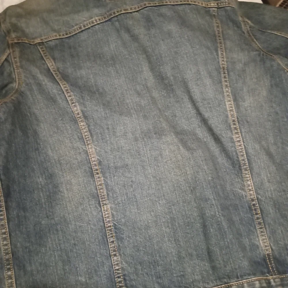 Levi's Faded Blue Denim Trucker Jacket